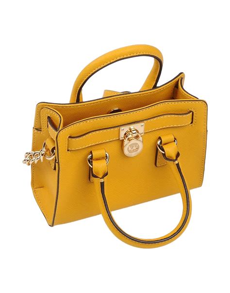 michael kors yellow purses|Michael Kors yellow crossbody purse.